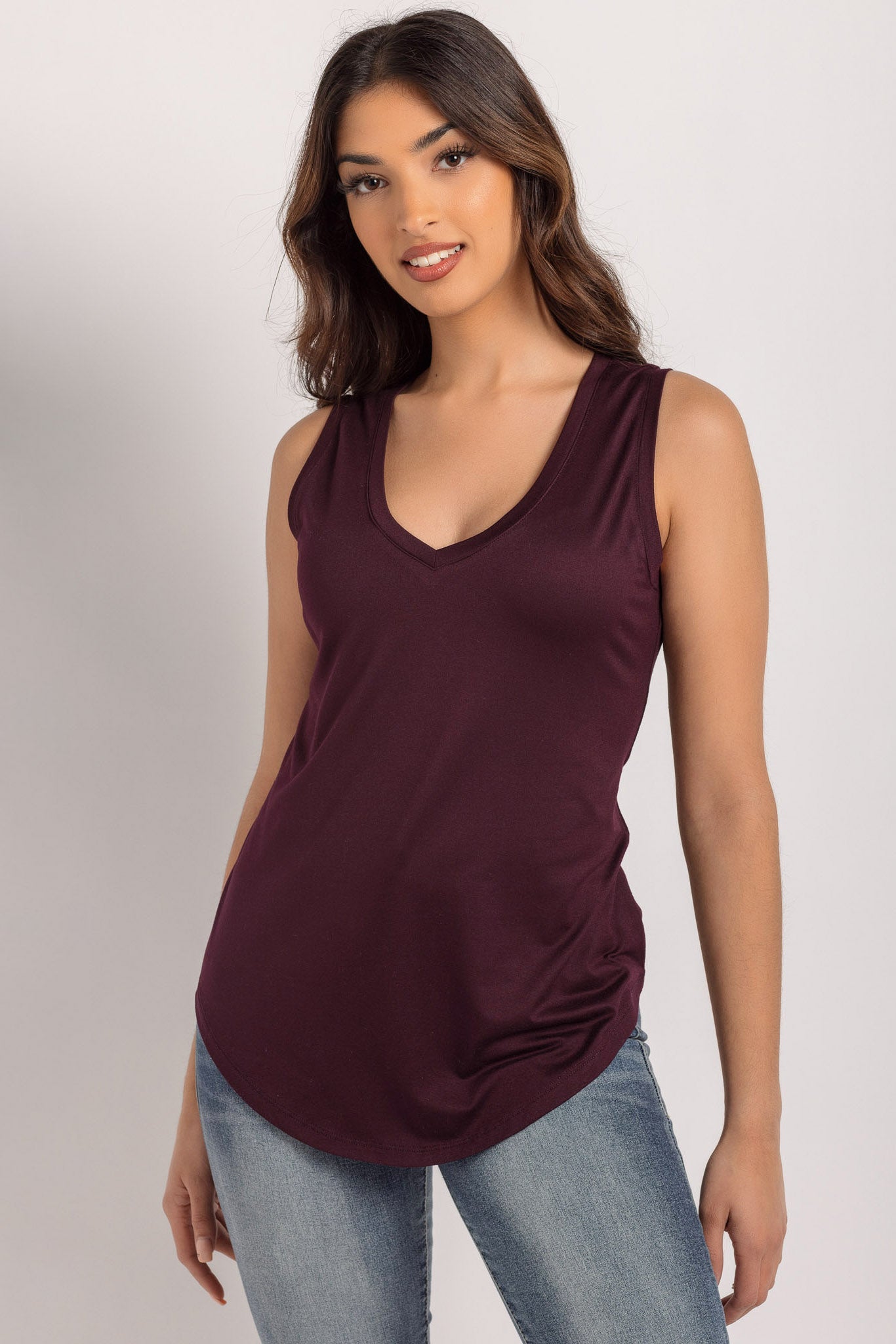 Sleeveless V-Neck Top with Shirttail Hem
