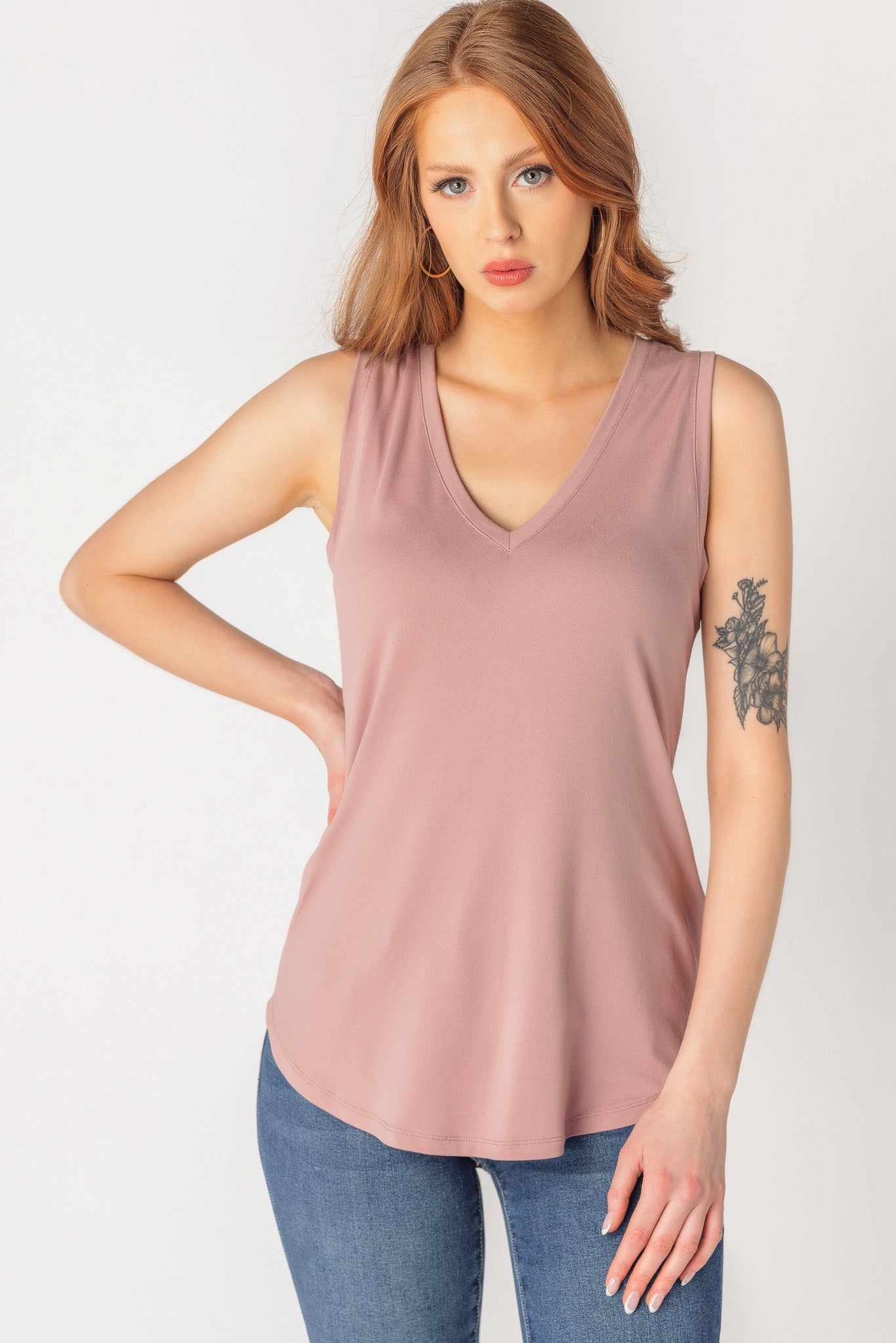 Sleeveless V-Neck Top with Shirttail Hem