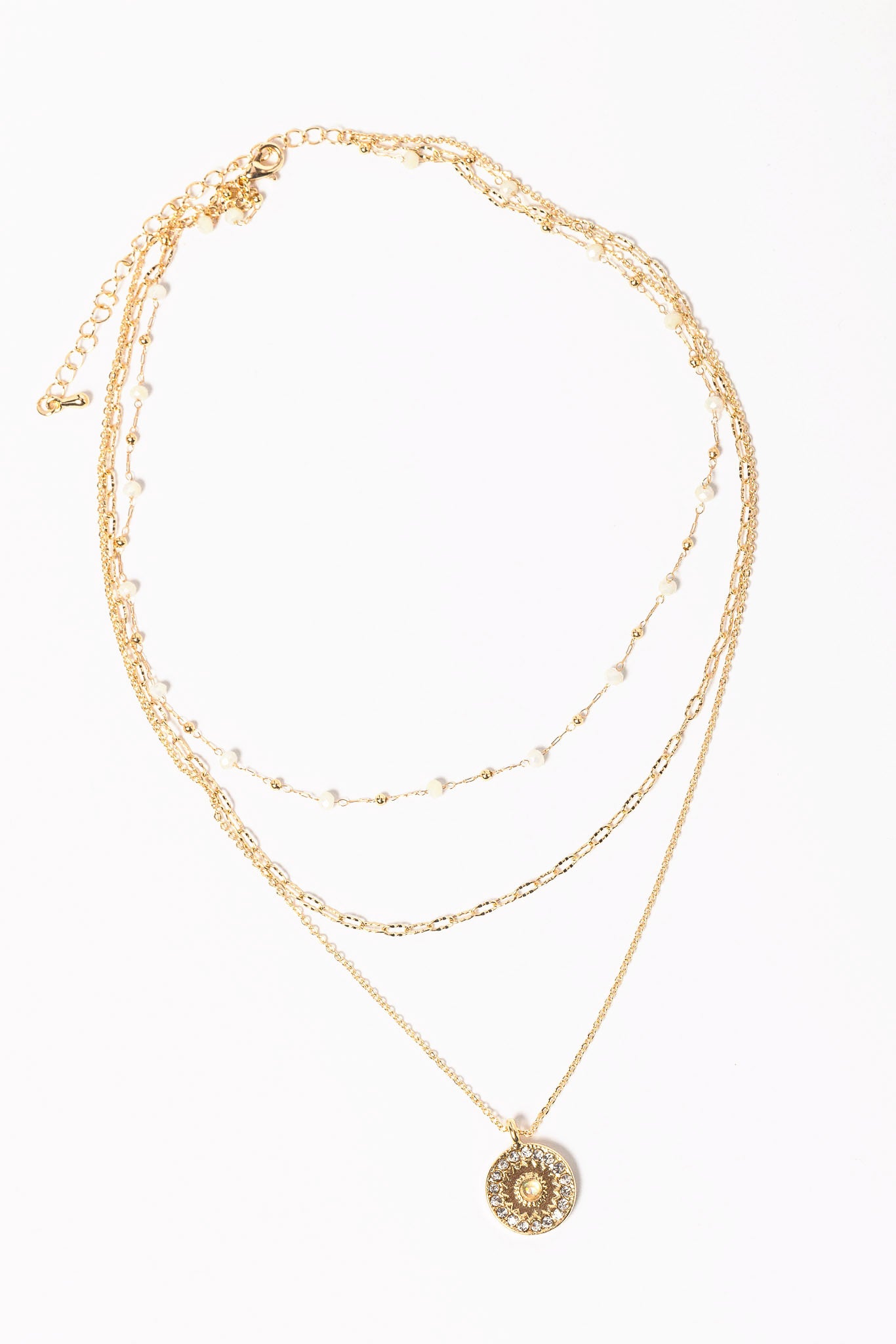 Triple Strand Necklace with Beads and Rhinestone Pendant